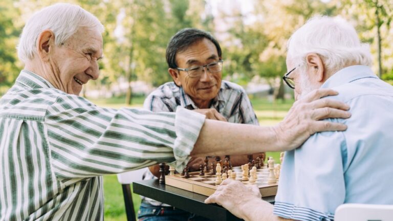 adult day program members playing chess
